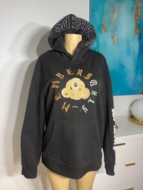 Black Hoodie with Gold Bear Graphic and Printed Hood